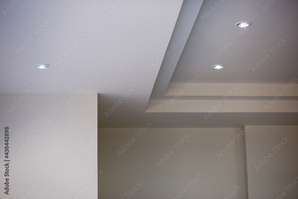 The walls and ceiling have just been painted white. Construction work of a bricklayer in Thailand. Background image The walls and ceiling have just been painted white. Construction work of a bricklayer in Thailand. Background image