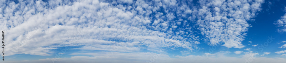 Panorama Blue sky and white clouds. Bfluffy cloud in the blue sky background Panorama Blue sky and white clouds. Bfluffy cloud in the blue sky background