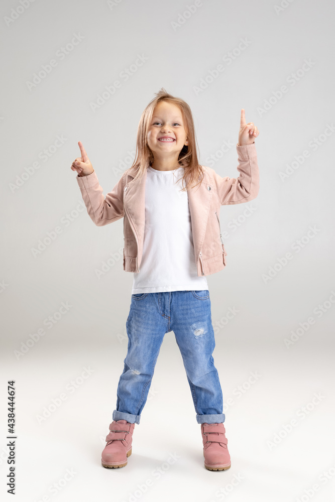 Caucasian girl isolated on white studio background. Copyspace. Childhood, education, emotions concept Caucasian girl isolated on white studio background. Copyspace. Childhood, education, emotions concept