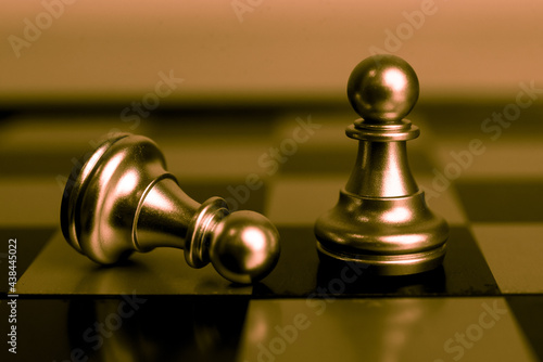 Closeup of chess characters on board games. to represent decision making in term of business strategy to find out the best solution to meet target objective and goal.	
 photo