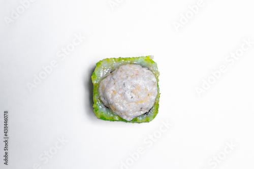 Philadelphia roll sushi with salmon, shrimps, avocado, cream cheese. Sushi menu. Japanese food..Sushi roll isolated on white close up