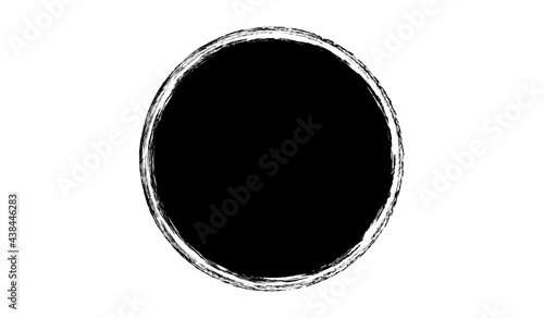 Grunge circle made of black paint.Grunge oval shape made of black ink.Grunge postal stamp.Oval grunge circle made with artistic brush.