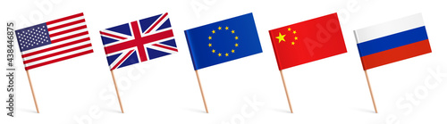 World flags with wooden sticks, sticked on a surface. Small paper world flags, vector illustration.