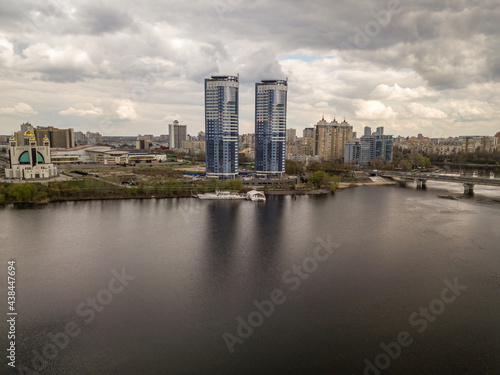 Residential area of Kiev near the river. Aerial drone view.