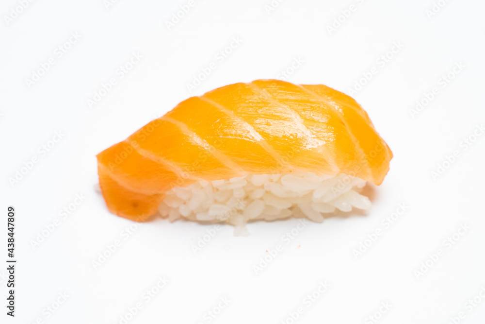 Philadelphia roll sushi with salmon, shrimps, avocado, cream cheese. Sushi menu. Japanese food..Sushi roll isolated on white close up