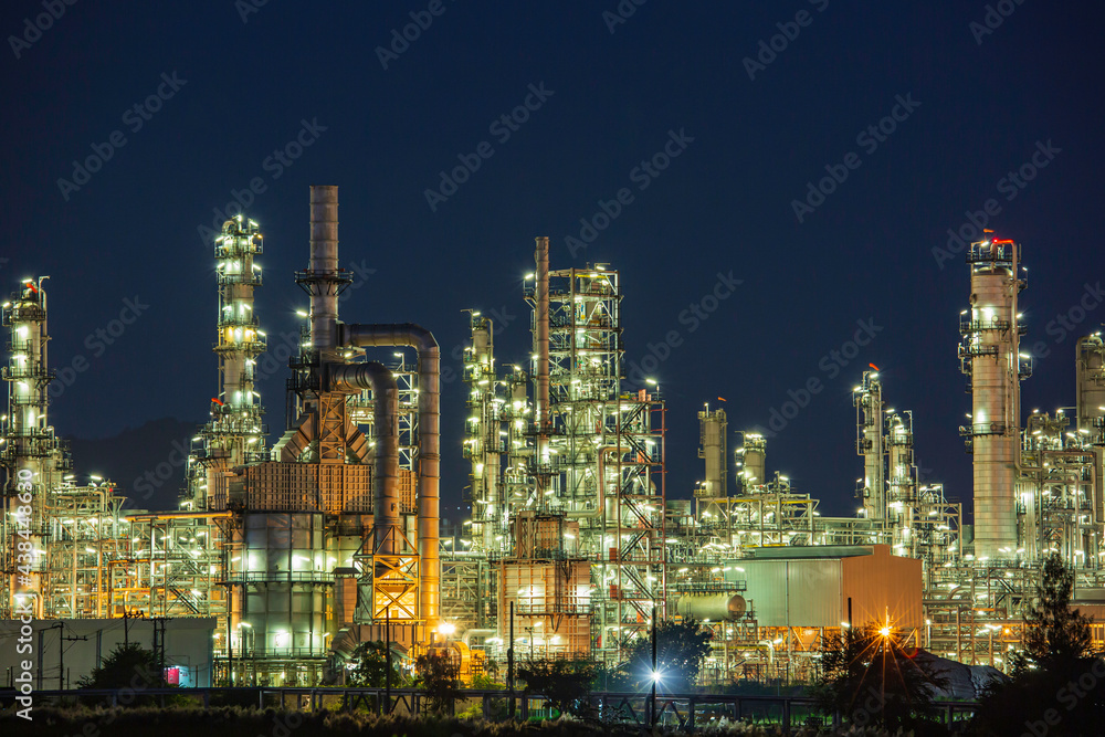 Fototapeta premium Night scene of oil refinery plant and power plant of Petrochemistry