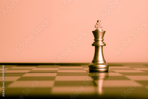 Closeup of chess characters on board games. to represent decision making in term of business strategy to find out the best solution to meet target objective and goal.