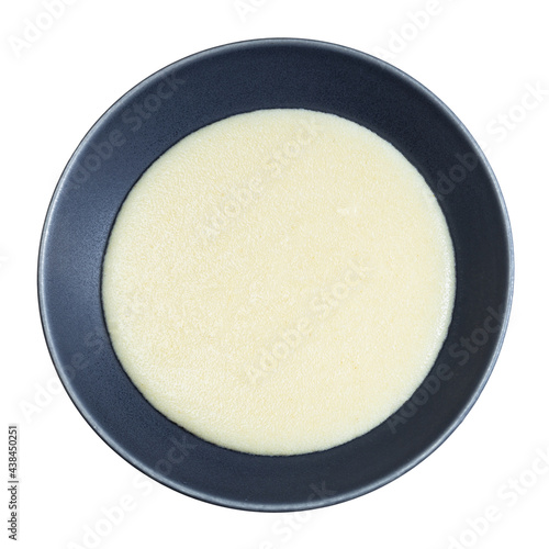 cooked semolina from durum in gray bowl isolated