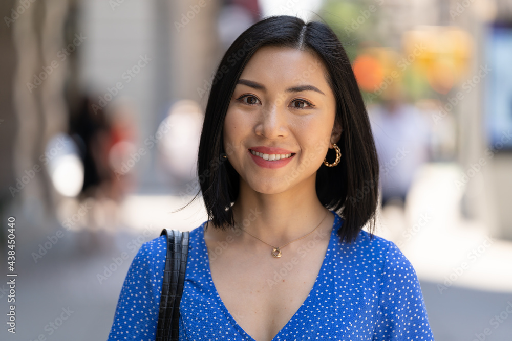 Young Asian woman in city smile happy face portrait Stock Photo | Adobe ...
