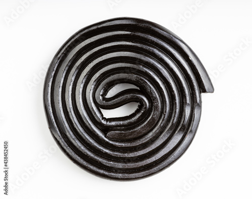 top view of spiral from liquorice candy on white photo