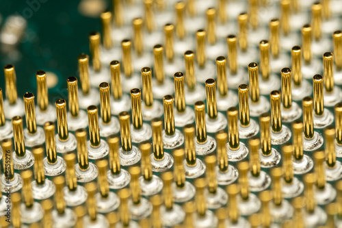 Closeup of old CPU Computer Processor with pins  and green PCB