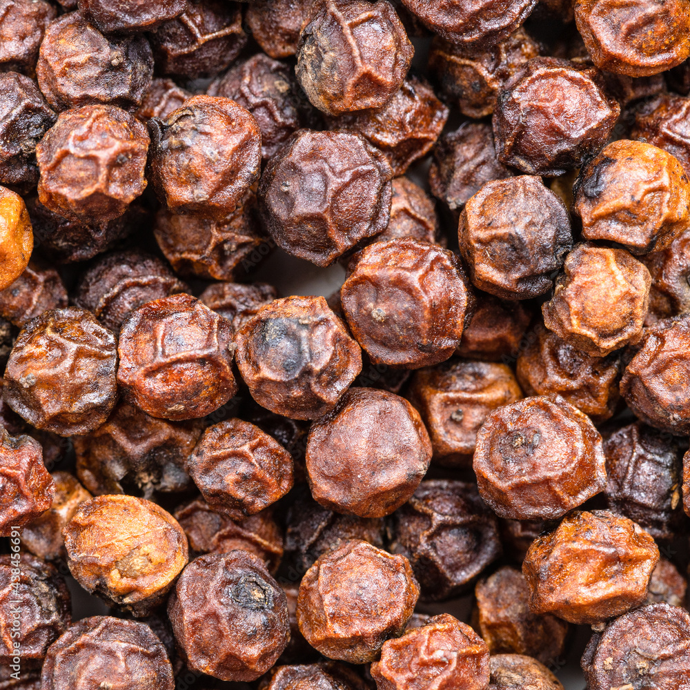 red kampot peppercorns close up red kampot peppercorns close up