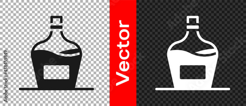 Black Old bottle of wine icon isolated on transparent background. Bottle of homemade wine. Vector