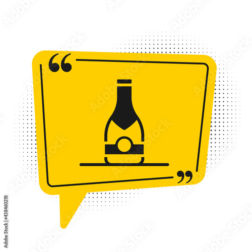 Black Champagne bottle icon isolated on white background. Yellow speech bubble symbol. Vector