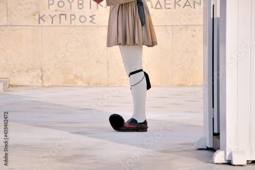 The traditional uniform of Presidential ceremonial guard soldiers (Evzones). The Tomb of the Unknown Soldier near Greek Parliament, Syntagma square, Athenes, Greece.