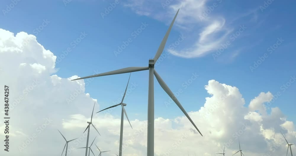 Aerial view of windmills farm on beautiful cloudy sky at highland Aerial view of windmills farm on beautiful cloudy sky at highland