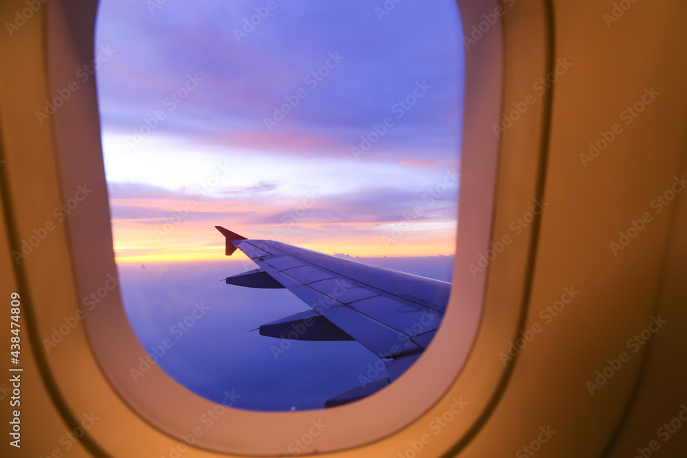 The beautiful colored sky from the view outside the plane window. The beautiful colored sky from the view outside the plane window.