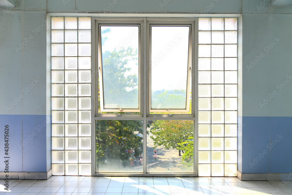 Glass block walls and glass windows allow light to illuminate the interior of the residence. Glass block walls and glass windows allow light to illuminate the interior of the residence.