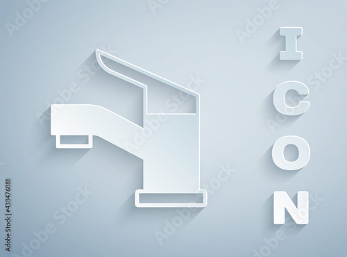 Paper cut Water tap icon isolated on grey background. Paper art style. Vector