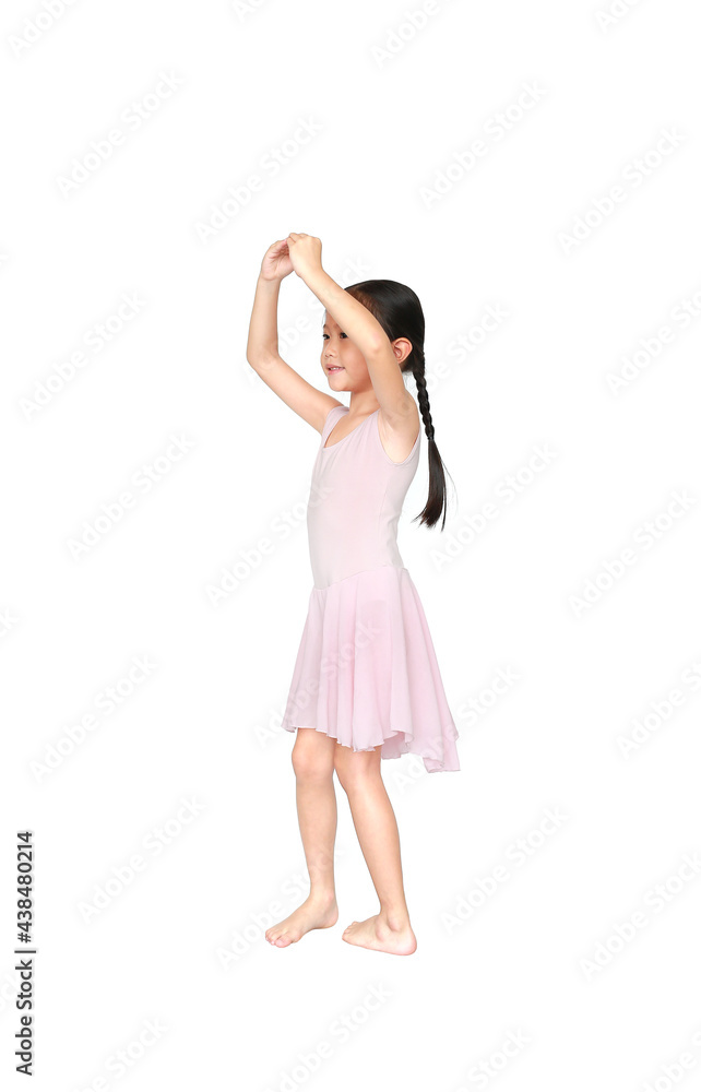 Little Asian child girl ballerina in pink tutu skirt isolated on white background. Kid practise her dance. Children ballet dancer side view. Little Asian child girl ballerina in pink tutu skirt isolated on white background. Kid practise her dance. Children ballet dancer side view.