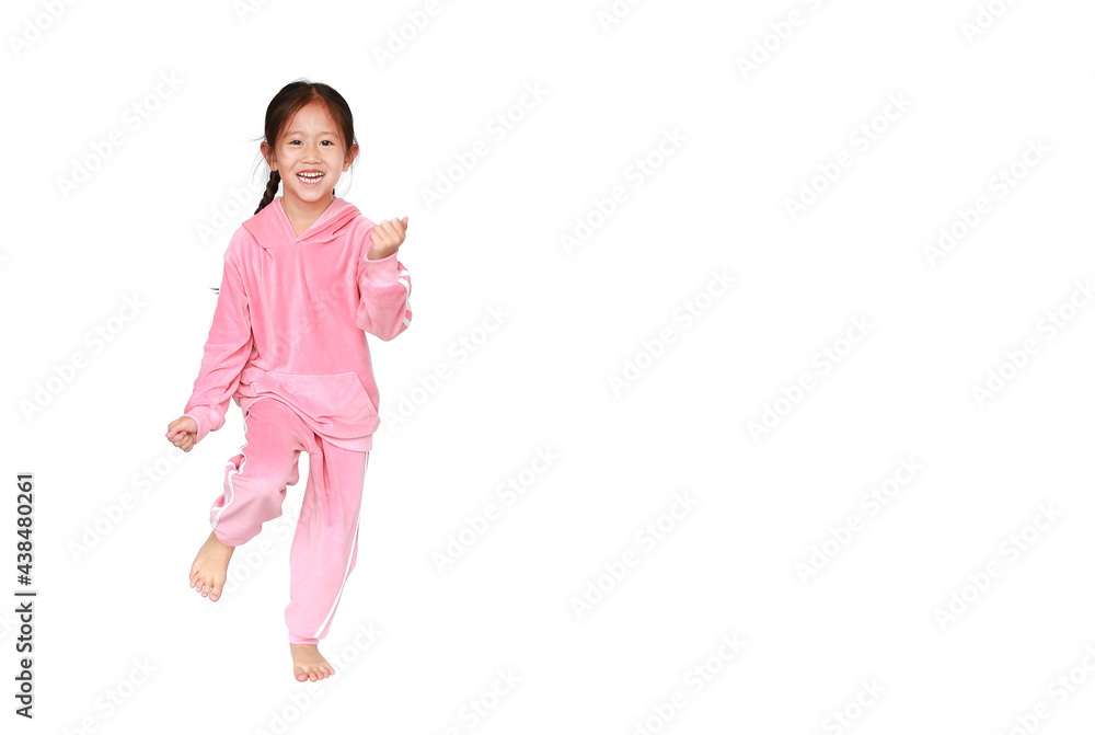 Smiling little Asian child girl in pink tracksuit or sport cloth running isolated over white background with copy space. Freedom and sport kid movement concept. Smiling little Asian child girl in pink tracksuit or sport cloth running isolated over white background with copy space. Freedom and sport kid movement concept.