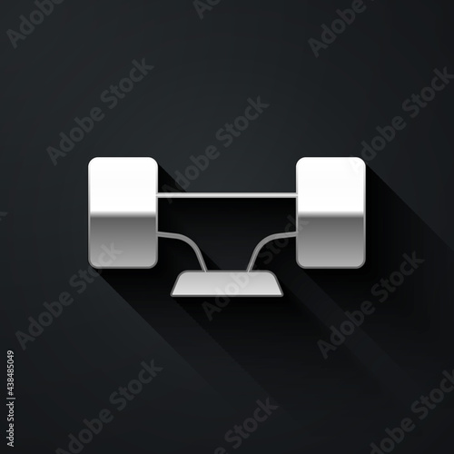 Silver Skateboard wheel icon isolated on black background. Skateboard suspension. Skate wheel. Long shadow style. Vector