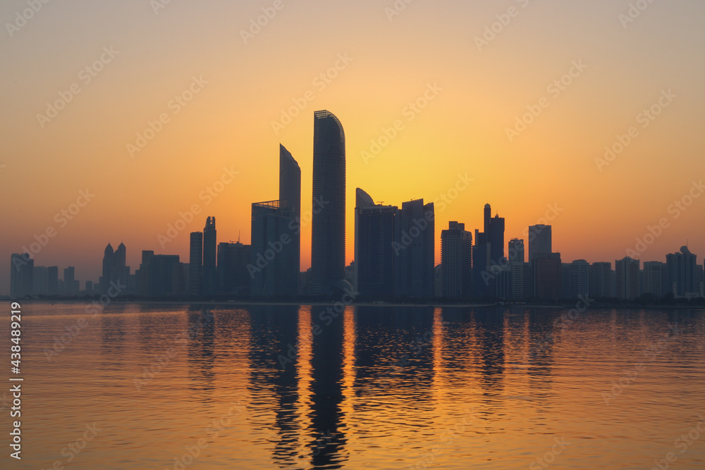 Abu Dhabi city skyline at sunrise 