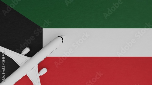 Top Down View of a Plane in the Corner on Top of the Country Flag of Kuwait
