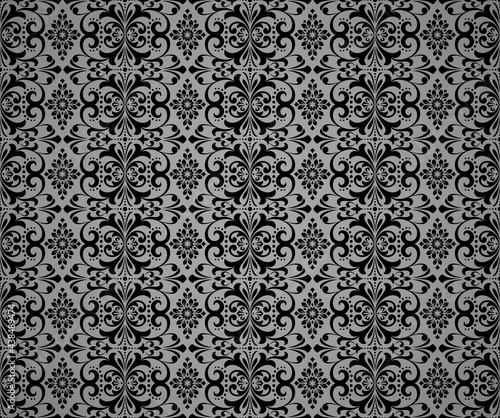 Wallpaper in the style of Baroque. Seamless vector background. Black and gray floral ornament. Graphic pattern for fabric, wallpaper, packaging. Ornate Damask flower ornament © ELENA