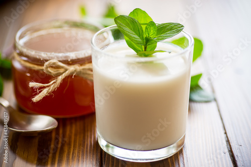 homemade yogurt in a glass and with jam