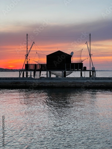 Molo di Levante Cesenatico durante un bellissimo  tramonto rosa