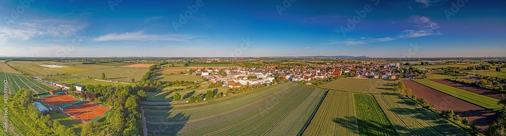 Drone image of the German, southern Hessian village Schneppenhausen near Darmstadt at sunset