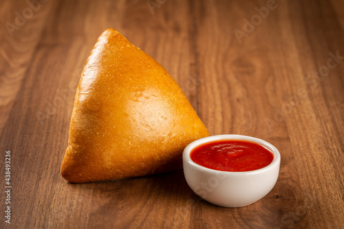 Arabic meat sfiha on the table.