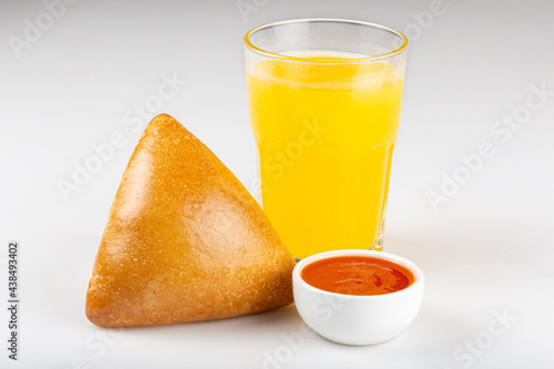Arabic meat sfiha with juice cop isolated on white background.