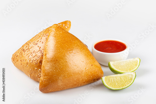 Arabic beef sfiha isolated on white background.