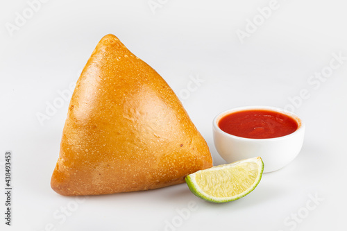 Arabic beef sfiha isolated on white background.