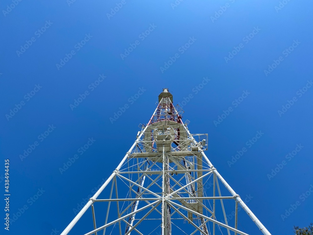telecommunication tower. telecommunication tower on a sky. mobile phone tower. 