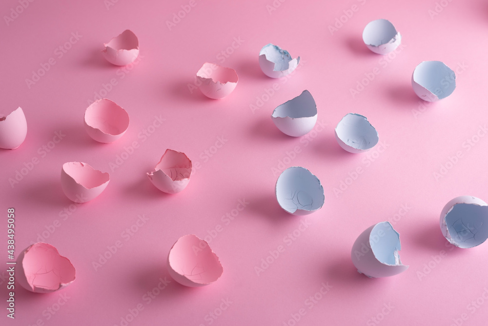 easter concept minimalistic, eggshells, painted pink-blue, on a solid background easter concept minimalistic, eggshells, painted pink-blue, on a solid background