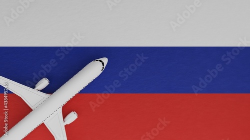 Top Down View of a Plane in the Corner on Top of the Country Flag of Russia