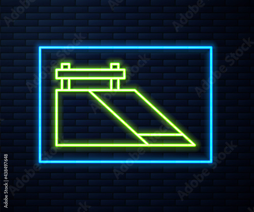 Glowing neon line Skate park icon isolated on brick wall background. Set of ramp, roller, stairs for a skatepark. Extreme sport. Vector