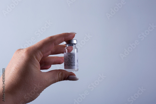 Ampoule with medicine in doctor's hand, vaccination