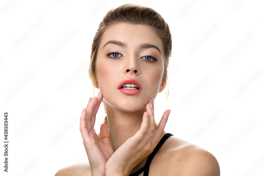 Beautiful young woman with clean perfect skin. Portrait of beauty model with professional make-up and long eyelashes isolated on white. Spa, skincare and wellness Beautiful young woman with clean perfect skin. Portrait of beauty model with professional make-up and long eyelashes isolated on white. Spa, skincare and wellness