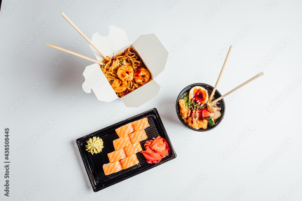 Top view on differnet Asian foods on bright background Top view on differnet Asian foods on bright background
