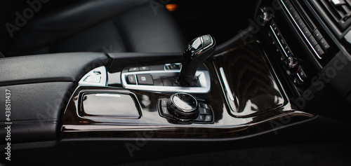 Automatic gear stick of a modern prestigious car close up.  © kucheruk