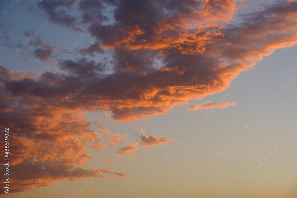 Fototapeta premium Sky with orange clouds at sunset