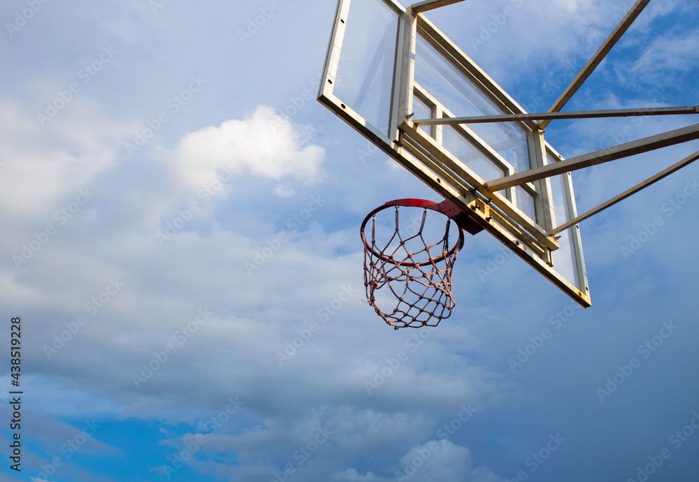 Basketball backboard with a ring on the street on the playground Basketball backboard with a ring on the street on the playground