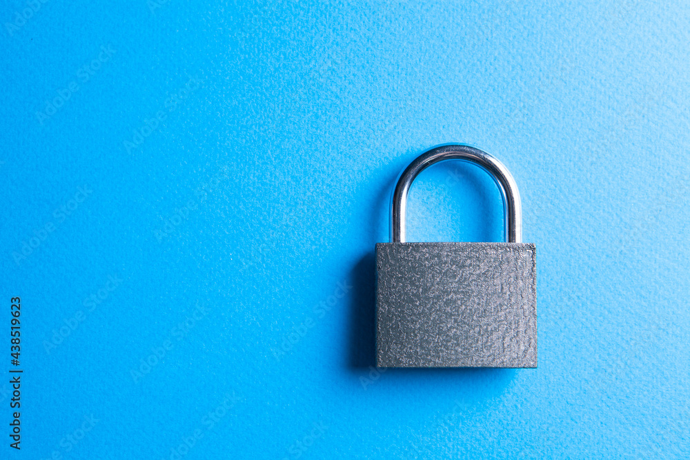 Fototapeta premium lock on a blue background