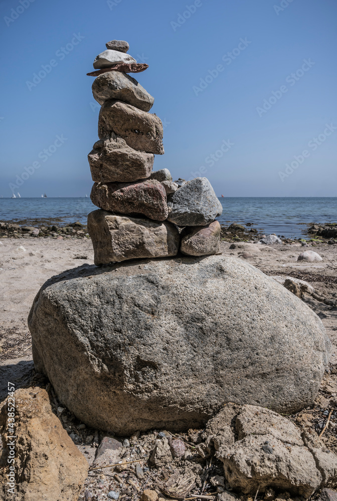 stacked rocks on the beach stacked rocks on the beach