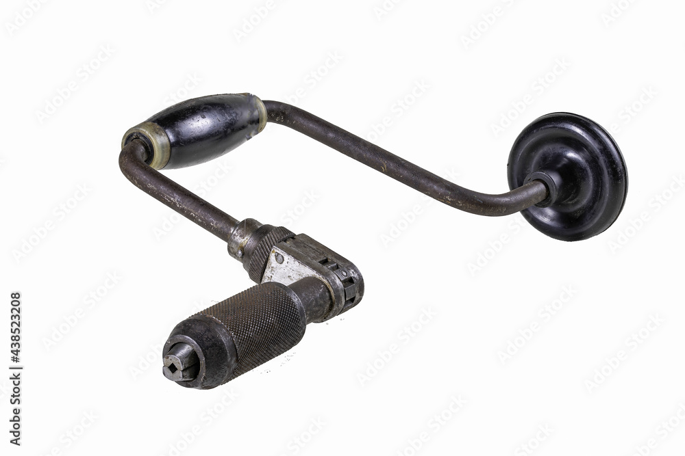A drill powered by human hands. Old carpentry accessories. A drill powered by human hands. Old carpentry accessories.