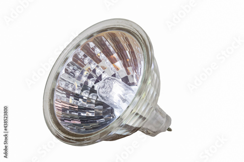 Halogen bulb in plastic housing. Accessories for illuminating the space in the household. photo